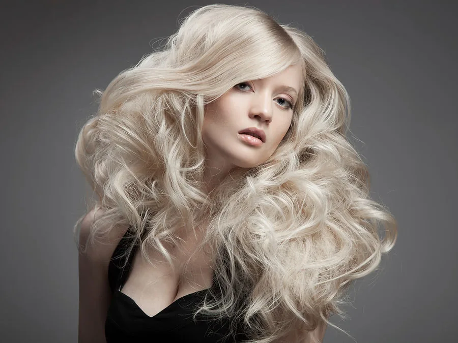 Full blonde color with soft waves